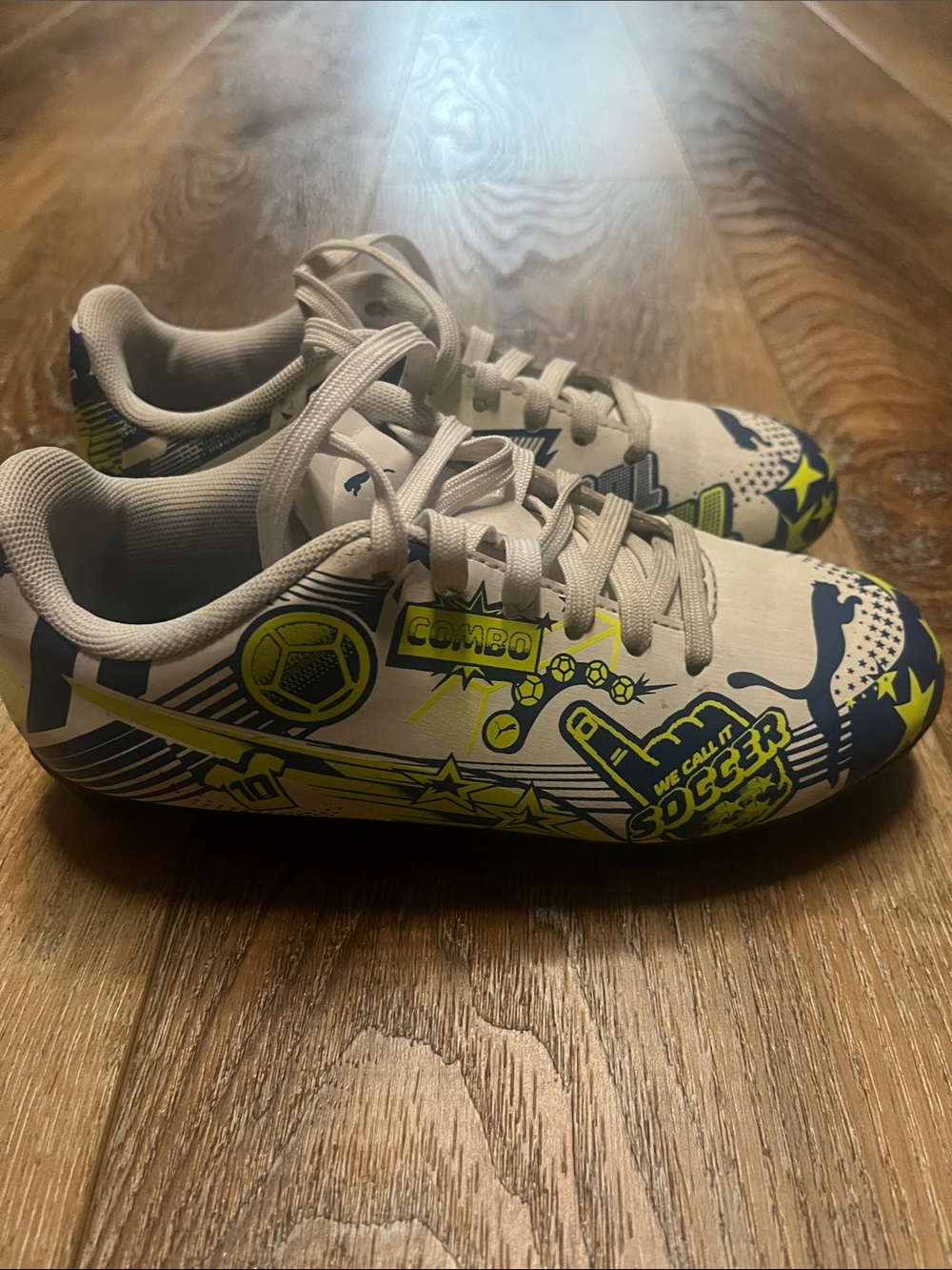 Puma Kids Soccer Shoes in White, Neon Yellow and Blue